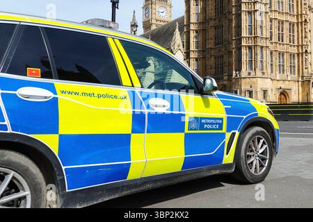 Police patrol car next to the Palace of Westminster, London, England United Kingdom UK Stock Photo