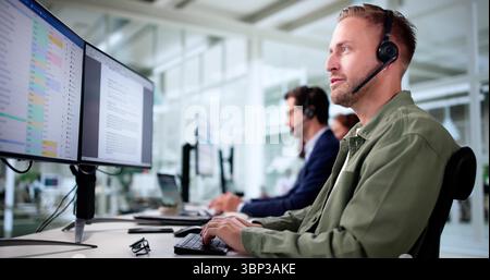 Happy Man And Woman Wearing Headsets Assist Clients Remotely Efficient Office Specialist With Headset Collaborating Stock Photo