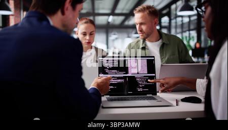 African Programmer Developing Code With Multiple Coding Methodologies. Stock Photo