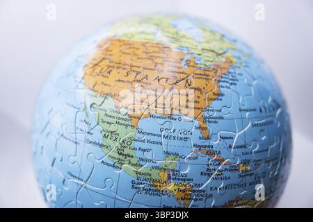 Puzzle globe. Map made from puzzle pieces. Gulf of Mexico Stock Photo