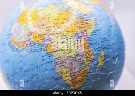 Puzzle globe. Map made from puzzle pieces. Africa Stock Photo