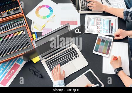 Team of designers working in office. Concept of search Stock Photo