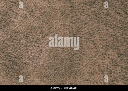 Detailed close up, macro of brown synthetic suede leather texture, faux leather, leatherette. Background for design, fashion, upholstery material visu Stock Photo