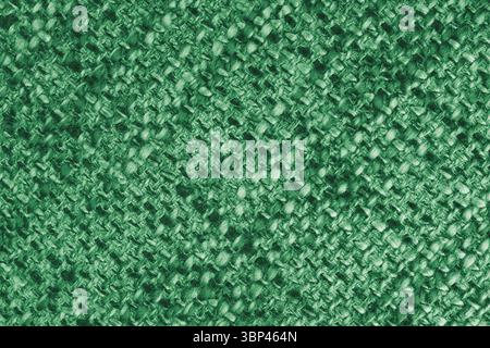Macro, close up of green woven burlap fabric, cloth texture with thick threads and rough textile pattern. Coarse textile surface with visible fibers. Stock Photo