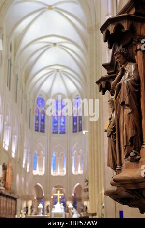 Interior view of vault of Norte-Dame Cathedral of Paris the the pulpit in the nave in foreground after the reopen from the April 2019.Paris.France Stock Photo