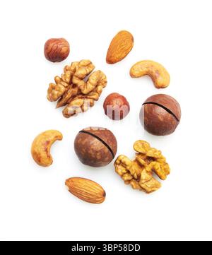 Pattern of nuts mix. Hazelnut, macadamia, almonds, walnut, cashew, isolated on white background. Top view. Stock Photo