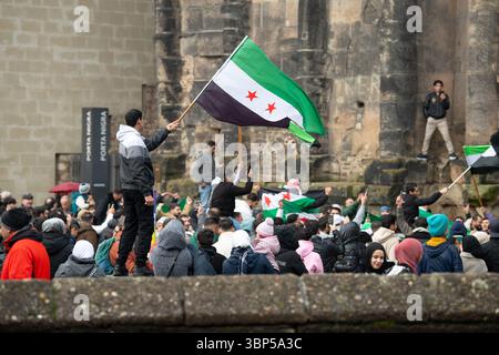 Syrians Celebrate After Assad Regime Toppled, War In The Middle East, Rebels And Islamists, Porta Nigra In Trier, Germany, 08.12.2024 Stock Photo
