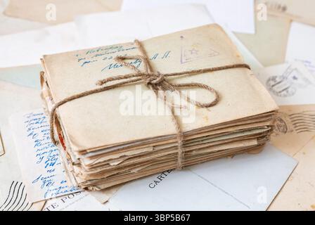 Stack of postal letters, old manuscripts and envelopes. Retro vintage background. Stock Photo
