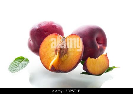 Bright ripe nectarines in studio shooting without background. Stock Photo