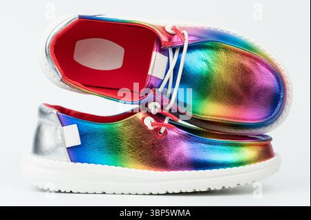 Pair of rainbow color shoes isolated on white studio background Stock Photo