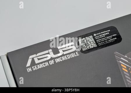 Kyiv, Ukraine - February 02, 2025: ASUS TUF Gaming motherboard package closeup on white. ASUS is a Taiwanese multinational computer, phone hardware an Stock Photo