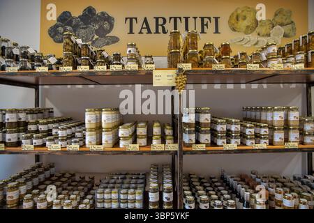 Motovun, Croatia - May 22, 2025: A wide array of gourmet truffle products, including spreads, oils, and sauces, neatly displayed for sale in a shop. Stock Photo