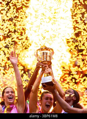 London Pulse players celebrate with the trophy after winning the ...