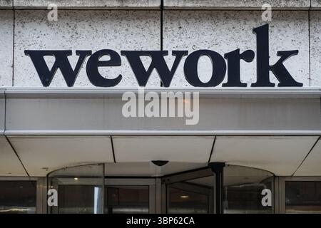 A sign outside WeWork offices in London England United Kingdom UK Stock Photo