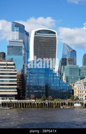 The City of London skyscrapers seen from the river Thames, The Square Mile business district in London, England, United Kingdom UK Stock Photo