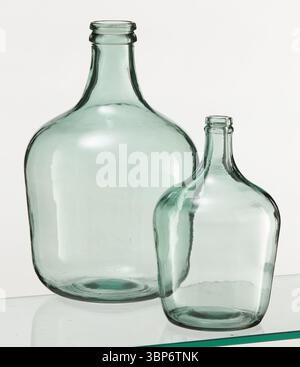 glass bottle empty big and small isolated nature background with clipping path Stock Photo