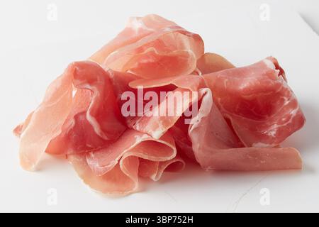 Smoked Ham Slices isolated nature background with clipping path Stock Photo