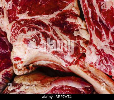 Food, High-quality image showcasing an array of raw beef cuts with marbling Stock Photo