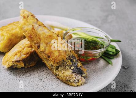 Food, Close up fried fish fillet with vegetables Stock Photo