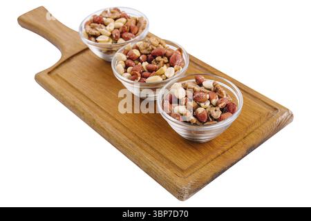 Food, Assorted nuts in a glass bowls on wooden Stock Photo