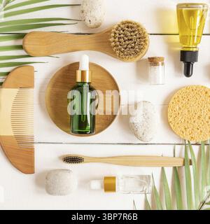 Set of bath personal accessories with eco cosmetics and bamboo toothbrushes on white background, pattern Stock Photo