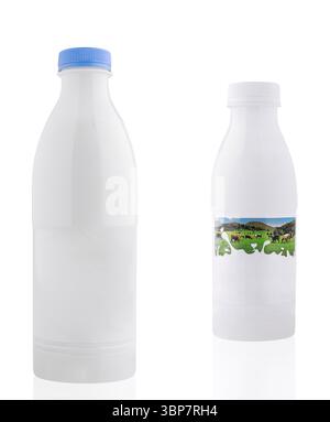 Food, Two white blank plastic bottles with screw caps, one with blue cap and one with farm illustration, are standing on white background Stock Photo