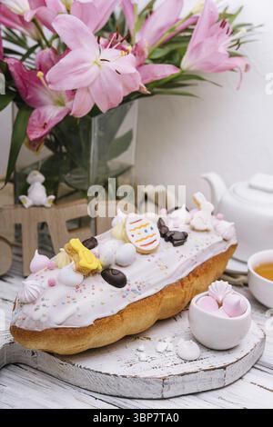 Food, Easter cake with meringue decorated with chocolate bunny and eggs Stock Photo