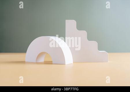 White concrete advertising stands with shadow. Gypsum podium for the presentation of cosmetic products Stock Photo