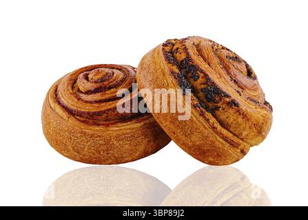 Food, Two delicious freshly baked cinnamon and poppy seed buns isolated on white background Stock Photo