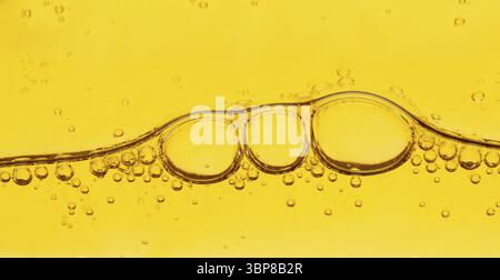 Abstract orange biology background, cells under microscope Stock Photo
