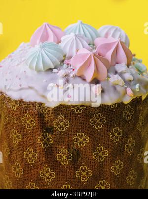 Food, Traditional Easter cakes with meringue on yellow background Stock Photo