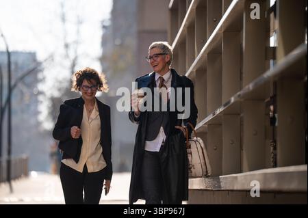Professional women walking in barcelona's business district Stock Photo