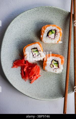 Salmon California roll served on the plate Stock Photo
