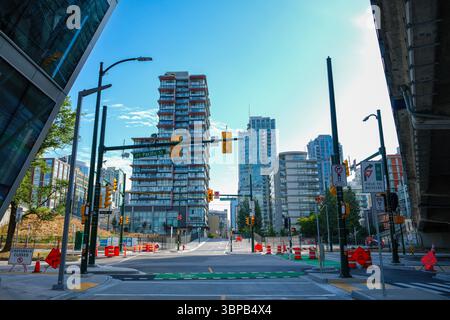 A new intersection along Pacific Boulevard by University Canada West in downtown Vancouver, BC. Stock Photo