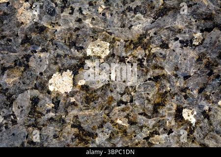 Background of polished black granite slab Stock Photo