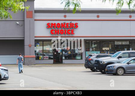 Utica, NY - Jun 29, 2025: Close-up view of Smokers Choice, it is the 6th largest tobacco outlet in the United States. Growing strong with over 50 reta Stock Photo