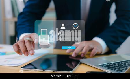 Businessman using virtual login interface on digital device, cybersecurity, data protection, identity verification, and secure online access in modern Stock Photo