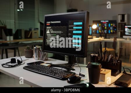 Closeup of desktop computer monitor displaying scam call center interface with fraudulent transaction details in modern office environment Stock Photo