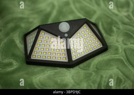new Solar lamp with motion sensor 100 LED, waterproof, for outdoor, wall mounting Stock Photo