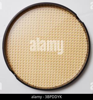 Aluminum tray, woven wood grid, top view isolated nature background with clipping path Stock Photo