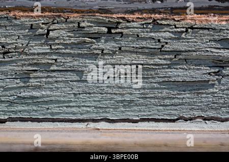 Old paint cracking on window sill Stock Photo