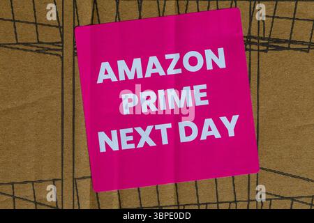 Amazon Prime Next Day pink sticker stuck on Amazon package parcel box ...
