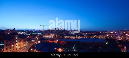 A night time view of Leeds city centre skyline, from the south, in 2002, without modern high rise buildings, West Yorkshire, Northern England, UK Stock Photo