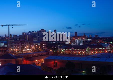 A night time view of Leeds city centre skyline, from the south, in 2002, without modern high rise buildings, West Yorkshire, Northern England, UK Stock Photo