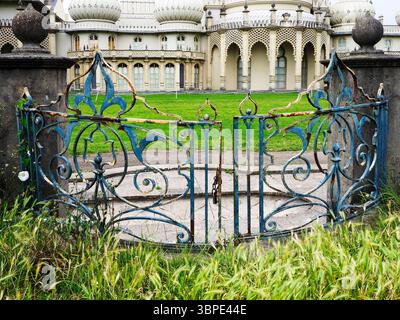 Rusty iron gates at The Royal Pavilion or Brighton Pavilion in Brighton East Sussex England Stock Photo