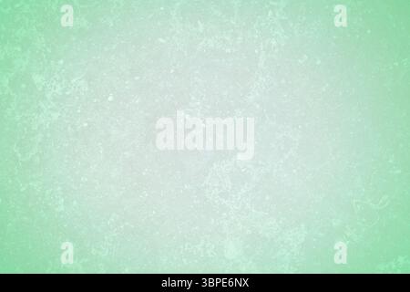 Green textured gradient surface is displaying distressed speckled texture in flat design style Stock Photo