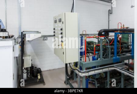 Flat design showing beige control panel cabinet on white brick wall, featuring pipes, cable trays Stock Photo