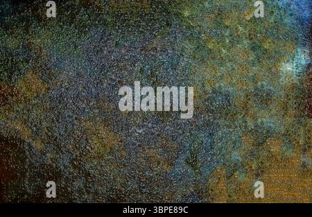 Grunge textured surface with colorful pattern forming an abstract background Stock Photo
