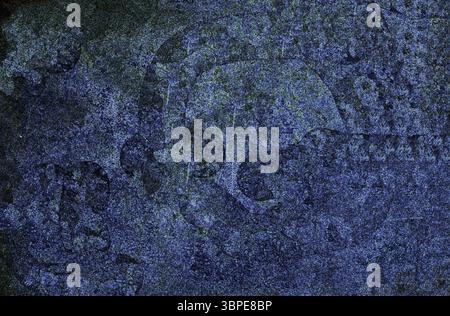 Dark blue stone texture showing rough surface with green accents Stock Photo
