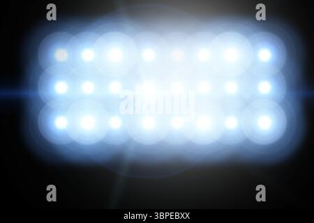 Rectangular LED panel is emitting intense glare and lens flare against dark backdrop, 3D render Stock Photo